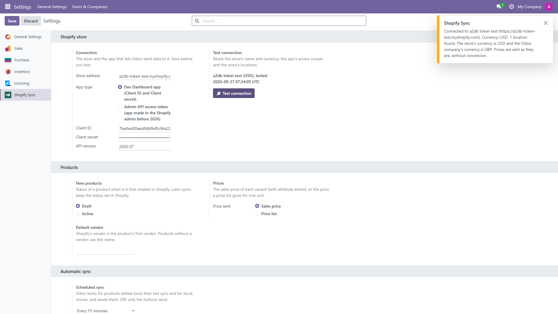Settings > Shopify Sync in Odoo: the store address, the Dev Dashboard app type, Client ID, Client secret, API version, and the Test connection message Connected to a2db token test, Currency USD, 1 location found